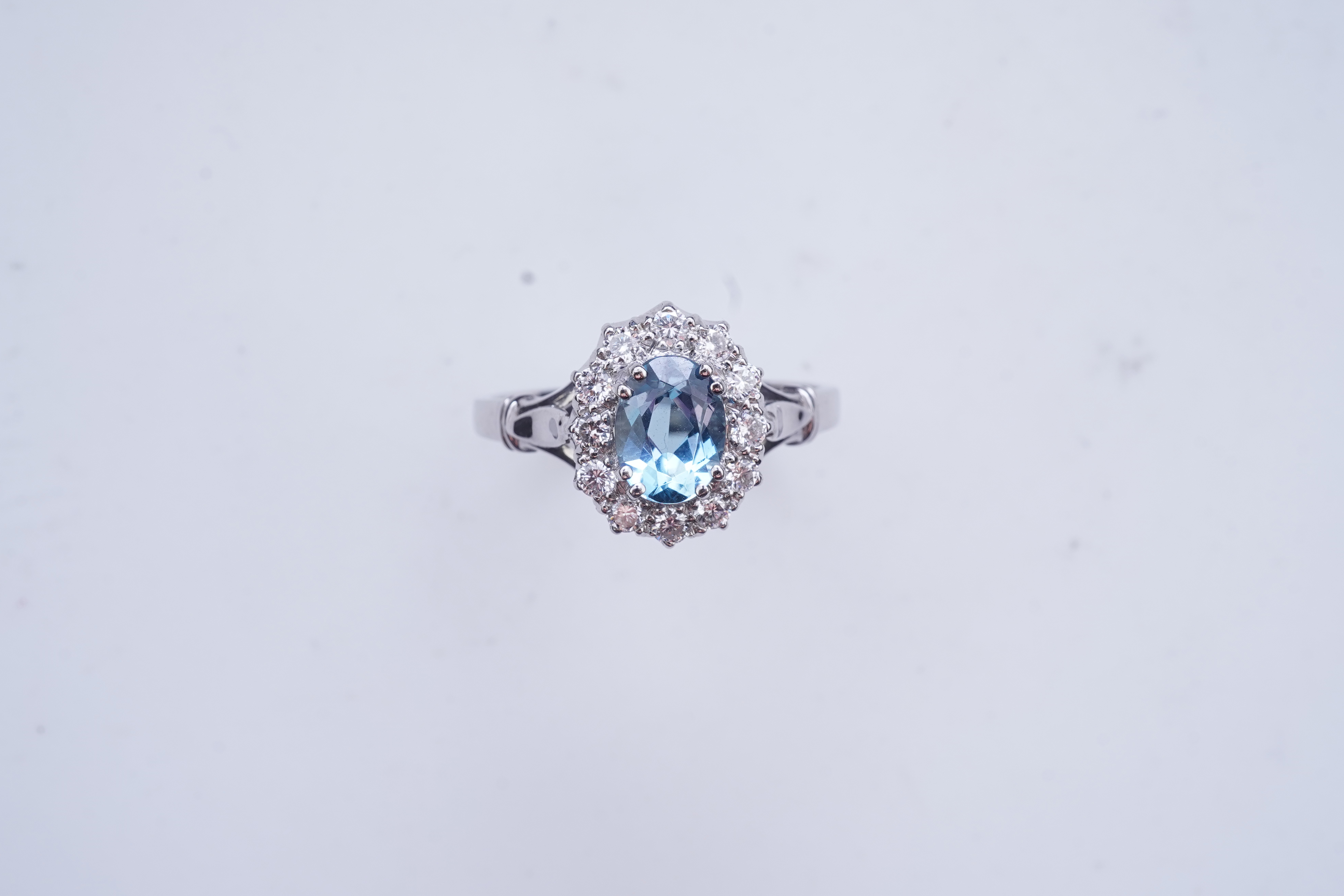 An aquamarine and diamond cluster ring